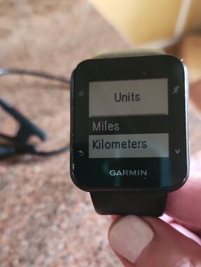 garmin black fitness smartwatch with monochrome display